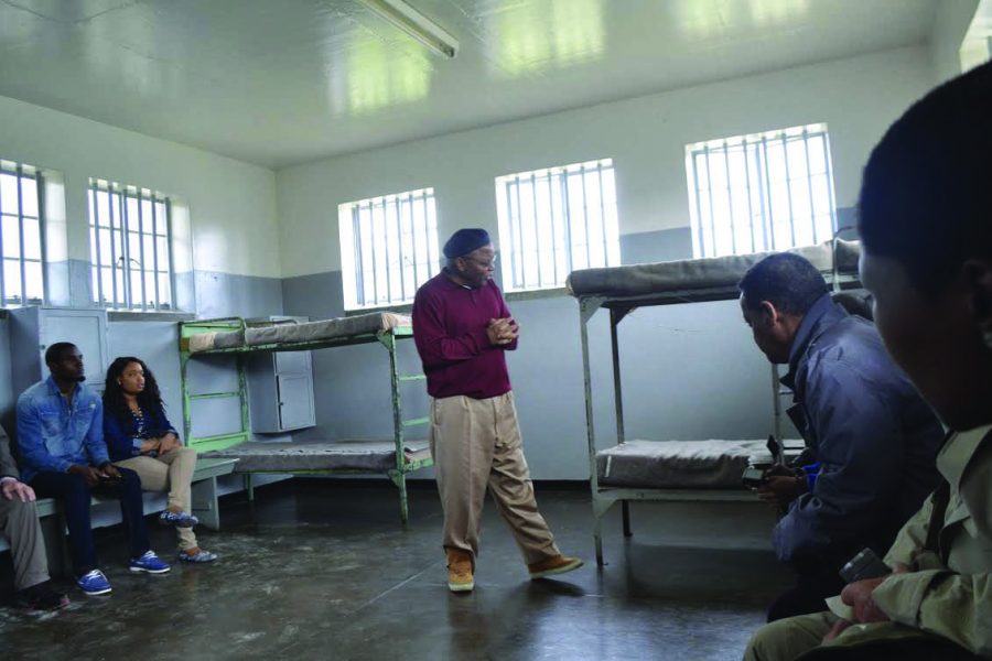 Ntando Mbatha looks at the bunk bed where he spent his nights during his incarceration on Robben Island. He had the top bunk, but once slept on the floor when a hunger strike left him too weak to climb the ladder.