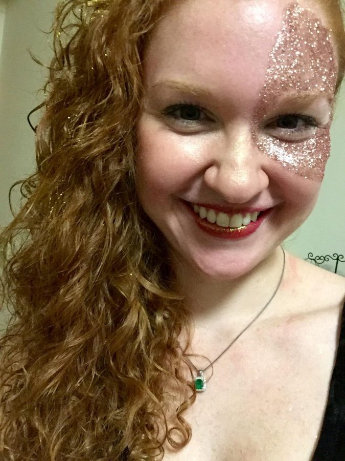A student wearing glittery makeup