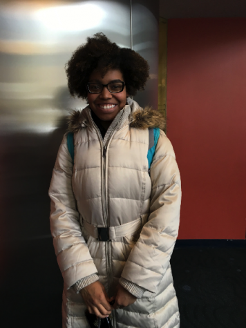 Simmons student poses in cozy winter coat