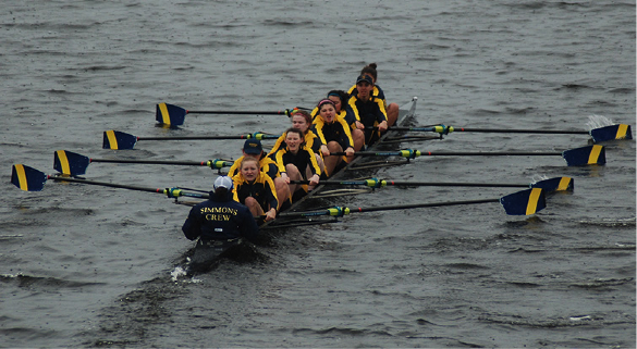 The Simmons crew team charges through Lake Quinsigamond