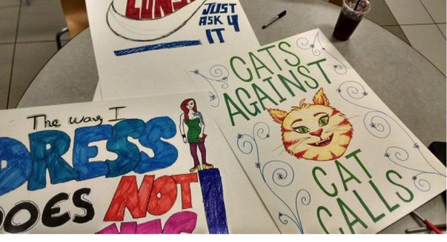 Take Back the Night posters, including "Cats Against Cat Calls"