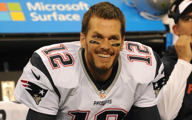 Oct 18, 2015; Indianapolis, IN, USA; New England Patriots quarterback Tom Brady smiles from the bench during the NFL game against the Indianapolis Colts at Lucas Oil Stadium. Mandatory Credit: Thomas J. Russo-USA TODAY Sports