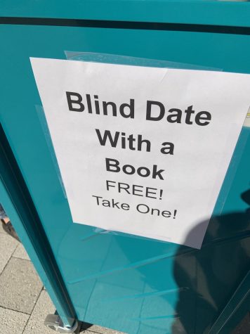 Blind Date With a Book cart at the new Porter Square Books location in Seaport. 